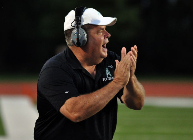 Whiting coach Jeff Cain cheers his team on against Boone Grove
